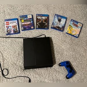 Play Station 4 with controller and 5 games